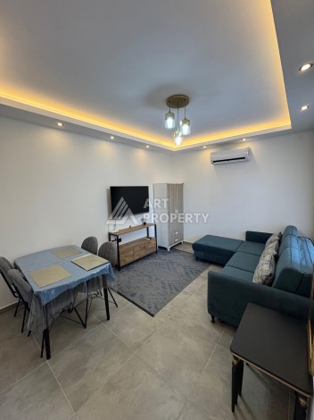 Квартира 1+1 с мебелью, 350 м от моря в центре Махмутлара - Ракурс 17