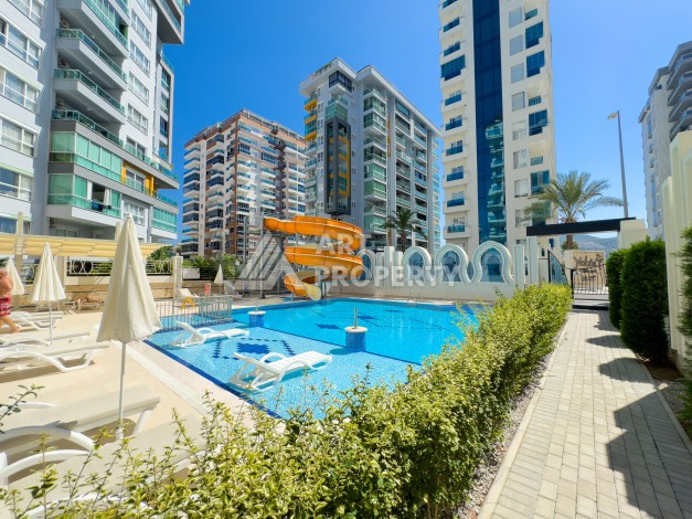 Меблированная квартира 1+1 в Махмутларе, всего 300 м от моря - Ракурс 2