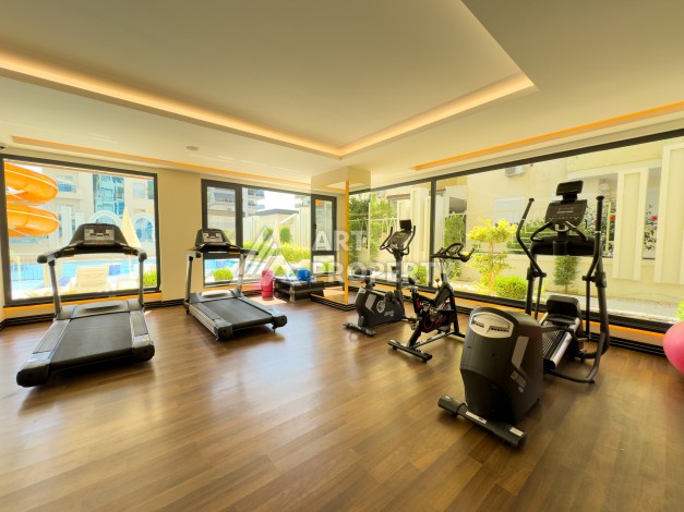 Меблированная квартира 1+1 в Махмутларе, всего 300 м от моря - Ракурс 9