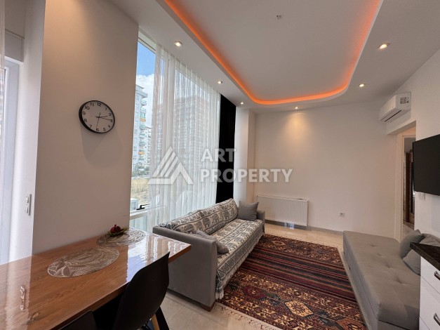 Меблированная квартира 1+1 в Махмутларе, всего 300 м от моря - Ракурс 16