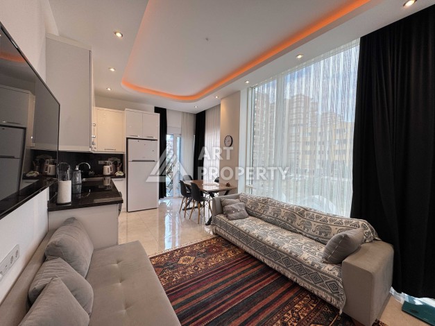 Меблированная квартира 1+1 в Махмутларе, всего 300 м от моря - Ракурс 17