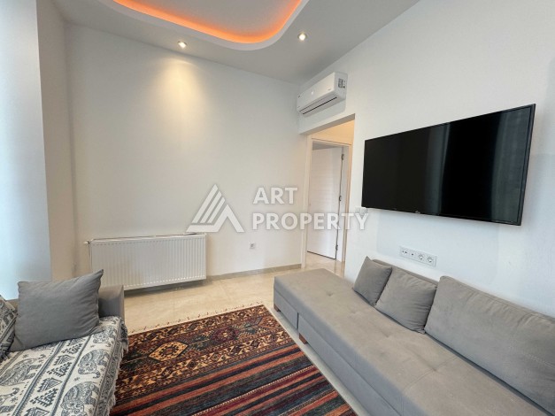 Меблированная квартира 1+1 в Махмутларе, всего 300 м от моря - Ракурс 19