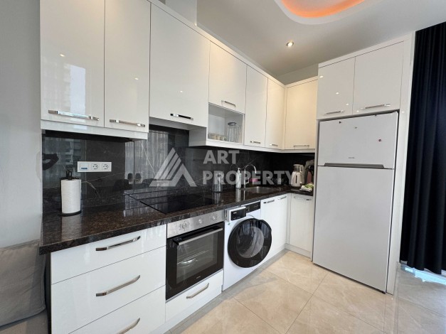 Меблированная квартира 1+1 в Махмутларе, всего 300 м от моря - Ракурс 22