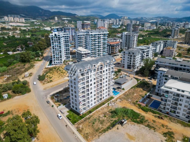 Квартира 1+1 с видом на горы в Махмутларе, 650 м от моря - Ракурс 1