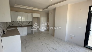 Квартира 1+1 с видом на горы в Махмутларе, 650 м от моря - Ракурс 8