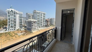 Квартира 1+1 с видом на горы в Махмутларе, 650 м от моря - Ракурс 10