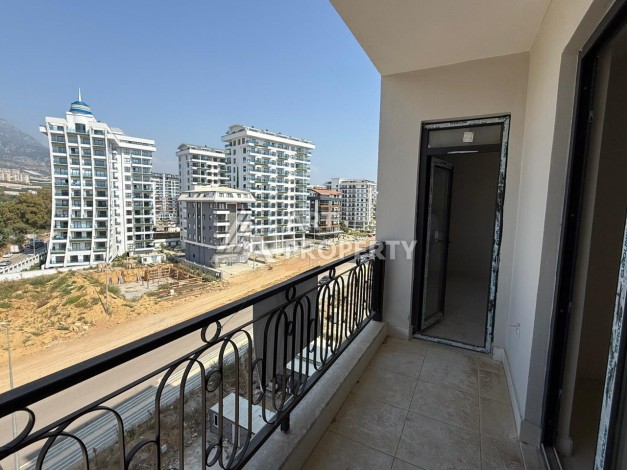 Квартира 1+1 с видом на горы в Махмутларе, 650 м от моря - Ракурс 9
