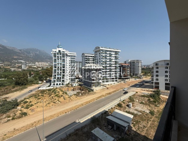 Квартира 1+1 с видом на горы в Махмутларе, 650 м от моря - Ракурс 10