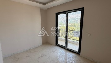 Квартира 1+1 с видом на горы в Махмутларе, 650 м от моря - Ракурс 15