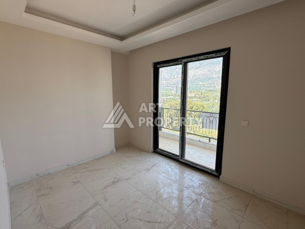 Квартира 1+1 с видом на горы в Махмутларе, 650 м от моря - Ракурс 14