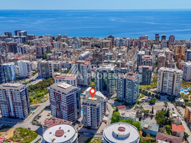 Квартира 1+1 площадью 60 м² в новом комплексе района Махмутлар по выгодной цене - Ракурс 0