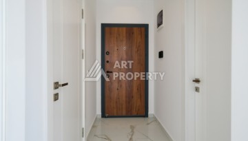 Квартира 1+1 площадью 60 м² в новом комплексе района Махмутлар по выгодной цене - Ракурс 2