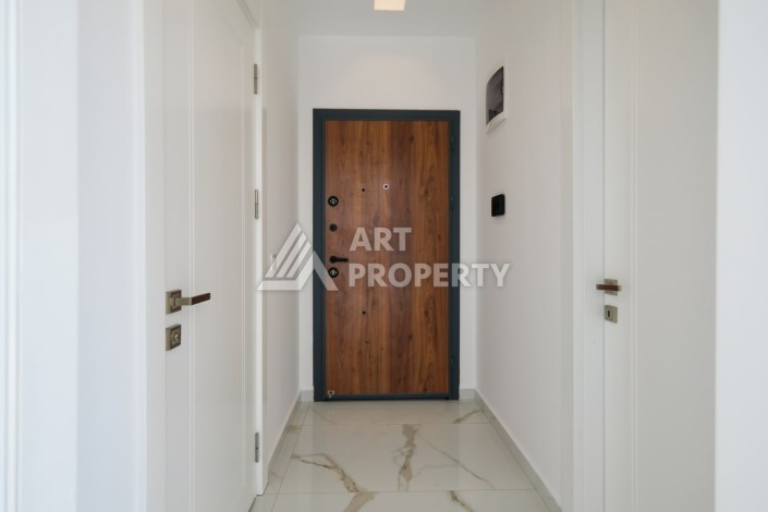 Квартира 1+1 площадью 60 м² в новом комплексе района Махмутлар по выгодной цене - Ракурс 1