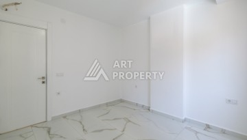 Квартира 1+1 площадью 60 м² в новом комплексе района Махмутлар по выгодной цене - Ракурс 4