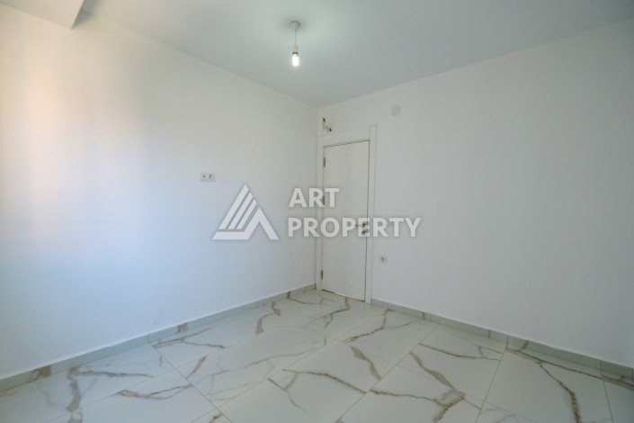 Квартира 1+1 площадью 60 м² в новом комплексе района Махмутлар по выгодной цене - Ракурс 5