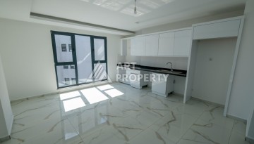 Квартира 1+1 площадью 60 м² в новом комплексе района Махмутлар по выгодной цене - Ракурс 7