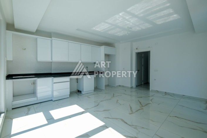 Квартира 1+1 площадью 60 м² в новом комплексе района Махмутлар по выгодной цене - Ракурс 7