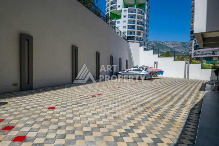 Квартира 1+1 площадью 60 м² в новом комплексе района Махмутлар по выгодной цене - Ракурс 8