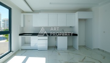 Квартира 1+1 площадью 60 м² в новом комплексе района Махмутлар по выгодной цене - Ракурс 11