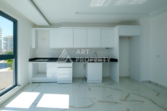 Квартира 1+1 площадью 60 м² в новом комплексе района Махмутлар по выгодной цене - Ракурс 10