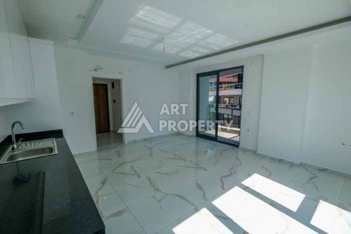 Квартира 1+1 площадью 60 м² в новом комплексе района Махмутлар по выгодной цене - Ракурс 11