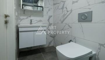 Квартира 1+1 площадью 60 м² в новом комплексе района Махмутлар по выгодной цене - Ракурс 16