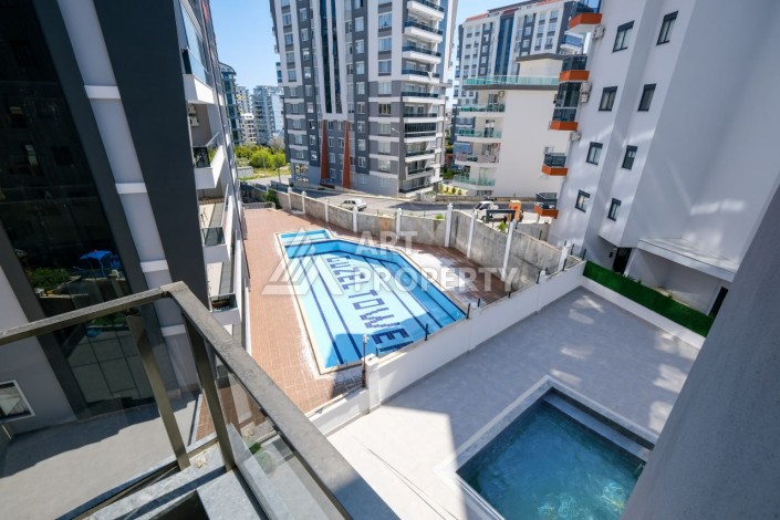 Квартира 1+1 площадью 60 м² в новом комплексе района Махмутлар по выгодной цене - Ракурс 23