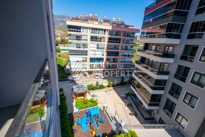 Квартира 1+1 площадью 60 м² в новом комплексе района Махмутлар по выгодной цене - Ракурс 24