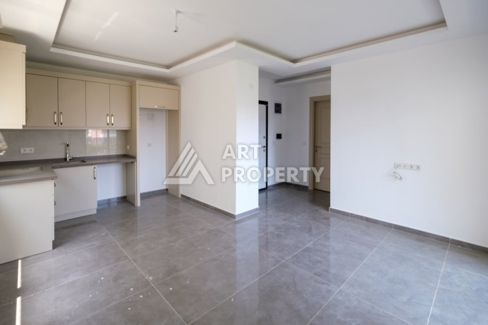 Просторная квартира 1+1 в 300 метрах от моря в центре Махмутлара - Ракурс 6