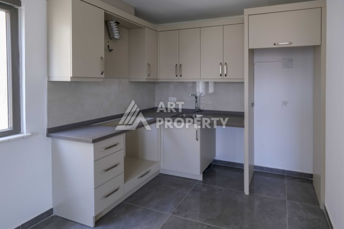 Просторная квартира 1+1 в 300 метрах от моря в центре Махмутлара - Ракурс 8