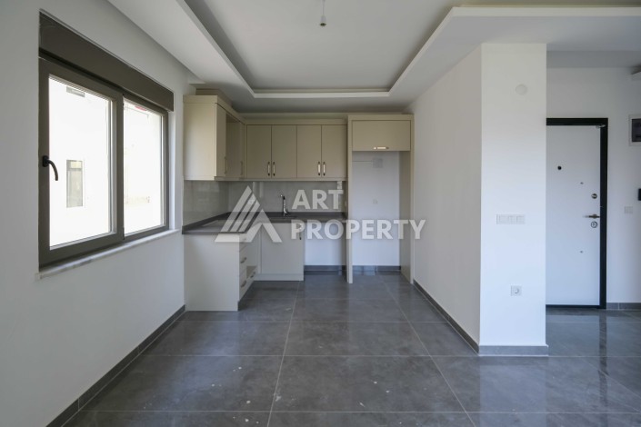 Просторная квартира 1+1 в 300 метрах от моря в центре Махмутлара - Ракурс 9