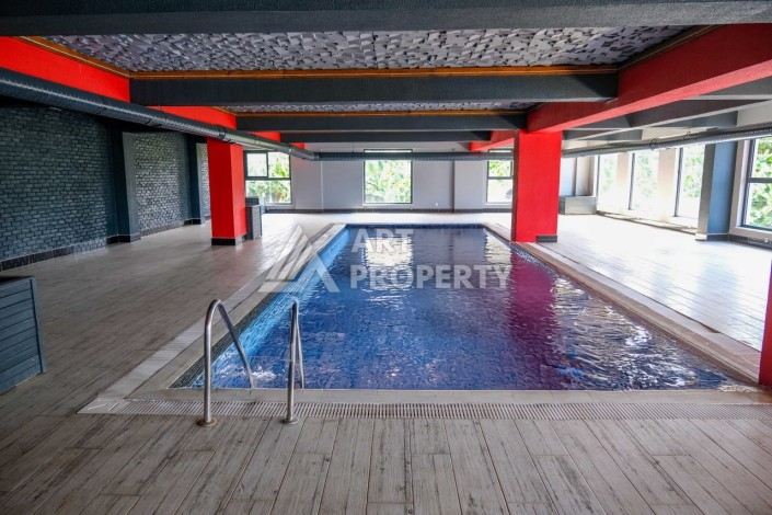 Меблированная квартира 1+1 с видом на море и горы в Махмутларе, в комплексе с бассейном на крыше - Ракурс 11