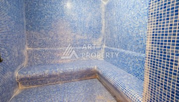 Меблированная квартира 1+1 с видом на море и горы в Махмутларе, в комплексе с бассейном на крыше - Ракурс 14