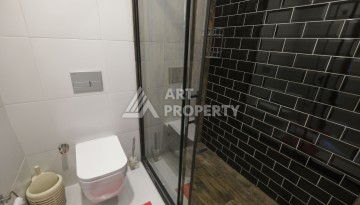 Меблированная квартира 1+1 с видом на море и горы в Махмутларе, в комплексе с бассейном на крыше - Ракурс 16