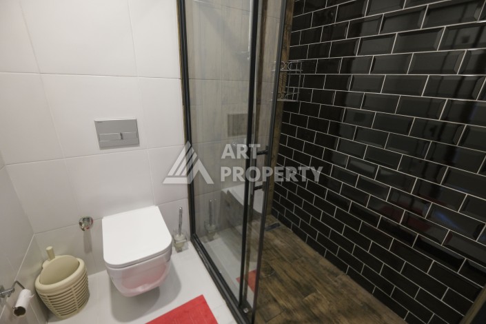 Меблированная квартира 1+1 с видом на море и горы в Махмутларе, в комплексе с бассейном на крыше - Ракурс 15