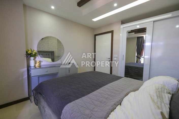 Меблированная квартира 1+1 с видом на море и горы в Махмутларе, в комплексе с бассейном на крыше - Ракурс 16