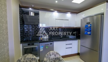 Меблированная квартира 1+1 с видом на море и горы в Махмутларе, в комплексе с бассейном на крыше - Ракурс 18