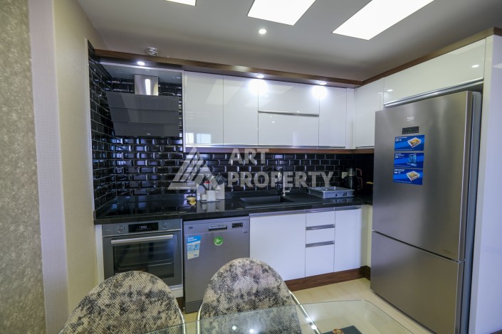 Меблированная квартира 1+1 с видом на море и горы в Махмутларе, в комплексе с бассейном на крыше - Ракурс 17