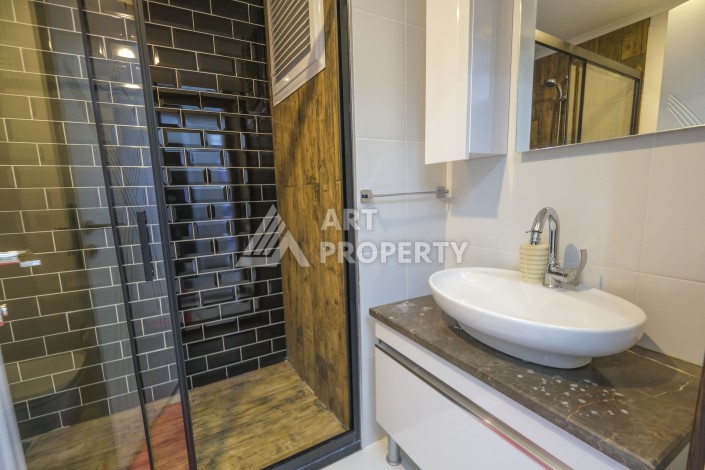 Меблированная квартира 1+1 с видом на море и горы в Махмутларе, в комплексе с бассейном на крыше - Ракурс 19