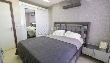 Меблированная квартира 1+1 с видом на море и горы в Махмутларе, в комплексе с бассейном на крыше - Ракурс 25