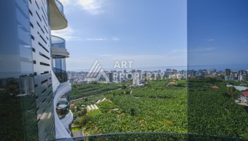 Меблированная квартира 1+1 с видом на море и горы в Махмутларе, в комплексе с бассейном на крыше - Ракурс 26