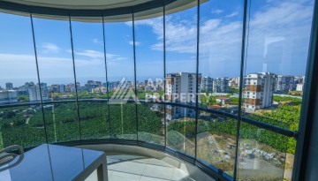 Меблированная квартира 1+1 с видом на море и горы в Махмутларе, в комплексе с бассейном на крыше - Ракурс 29