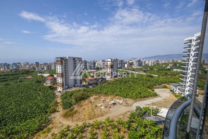 Меблированная квартира 1+1 с видом на море и горы в Махмутларе, в комплексе с бассейном на крыше - Ракурс 30