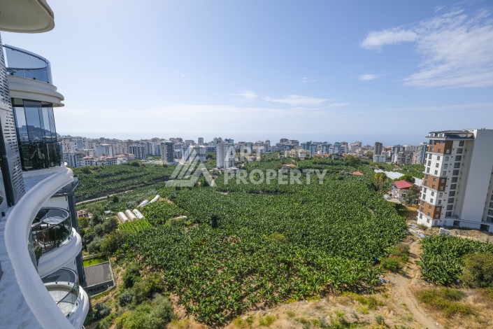 Меблированная квартира 1+1 с видом на море и горы в Махмутларе, в комплексе с бассейном на крыше - Ракурс 31