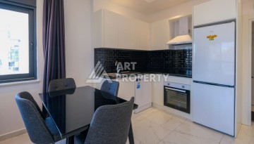 Стильная квартира 1+1 в Махмутларе. Всего 400 м до моря - Ракурс 12