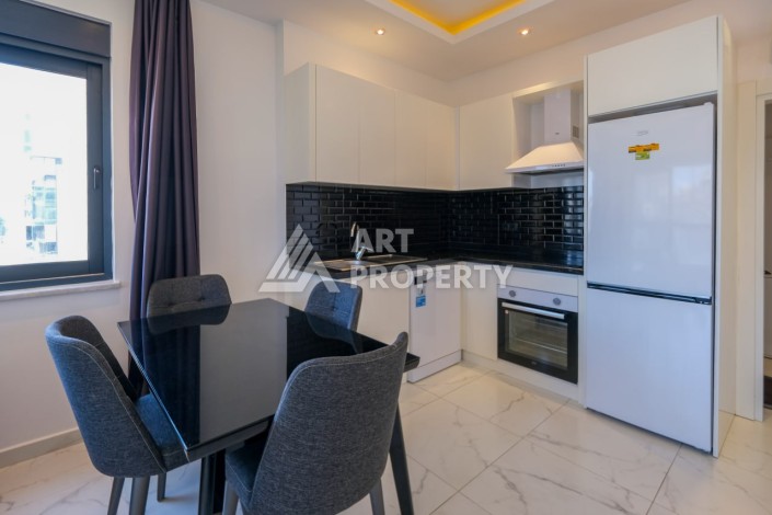 Стильная квартира 1+1 в Махмутларе. Всего 400 м до моря - Ракурс 11