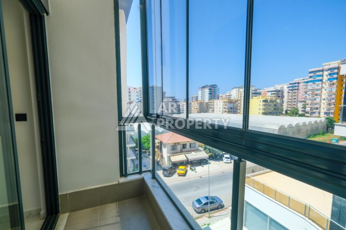 Стильная квартира 1+1 в Махмутларе. Всего 400 м до моря - Ракурс 15