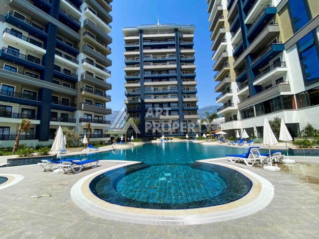 Меблированная квартира 1+1 в престижном комплексе Махмутлара. До моря 650 м. - Ракурс 0