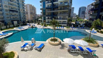 Меблированная квартира 1+1 в престижном комплексе Махмутлара. До моря 650 м. - Ракурс 2