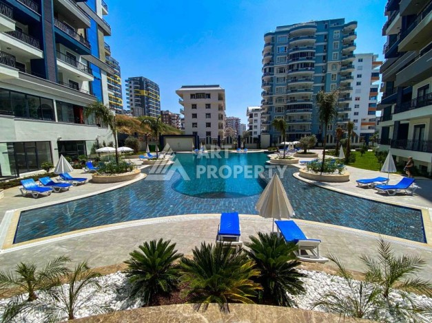 Меблированная квартира 1+1 в престижном комплексе Махмутлара. До моря 650 м. - Ракурс 2